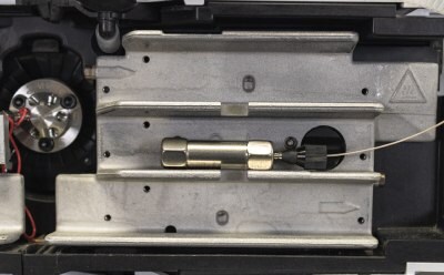 Stand-alone guard cartridge connected to inlet tubing. A second piece of tubing with a connecting nut is required to connect to the analytical column.