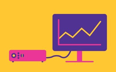 An illustration of a projector connected to a computer monitor displaying a line graph.